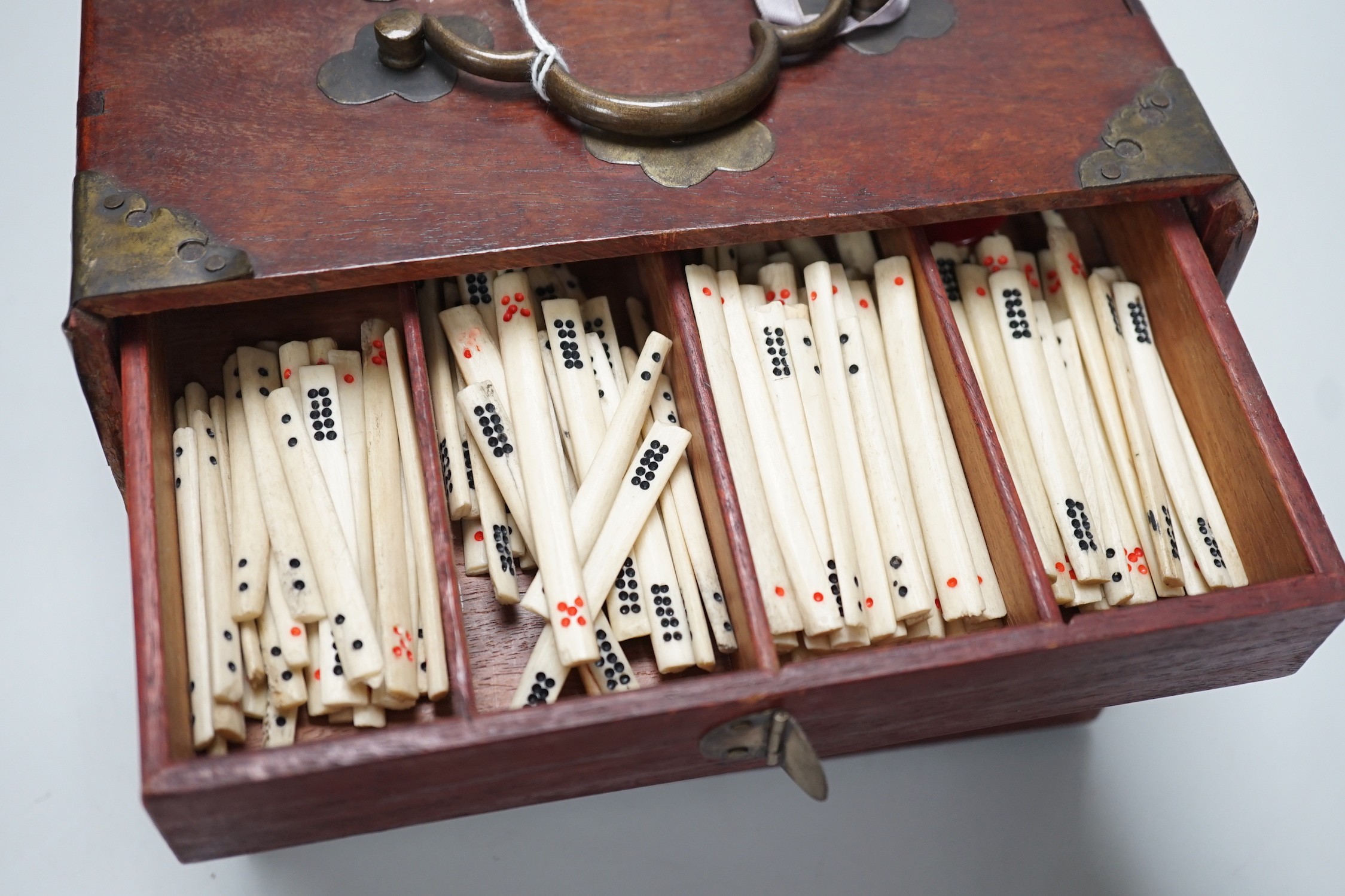 A 20th century MahJong set, together with playing racks with ivorine inlay